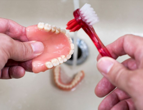 Stain removal from denture